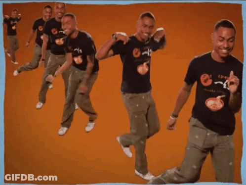 A Man Wearing A T-Shirt That Says ' Noodles ' On It Is Dancing GIF