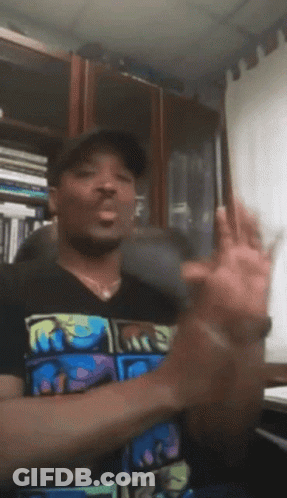 A Man Wearing A T-Shirt That Says R.i.p. GIF