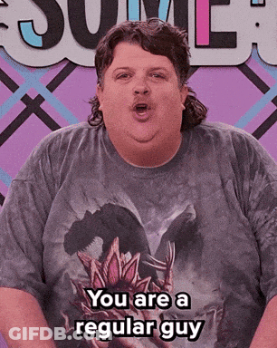 A Man Wearing A T-Shirt That Says " You Are A Regular Guy " GIF