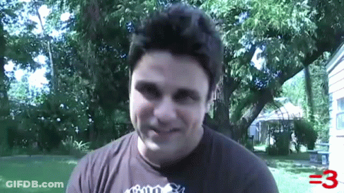 A Man Wearing A T-Shirt With The Number 3 Written On It GIF
