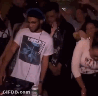 A Man Wearing A T-Shirt With The Word Karriem On It Is Playing Music GIF