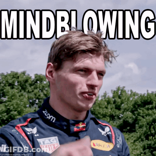 A Man Wearing A Tag Heuer Shirt Is Making A Funny Face GIF