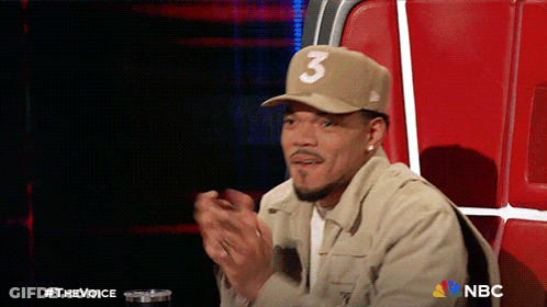 A Man Wearing A Tan Hat With The Number 3 On It GIF