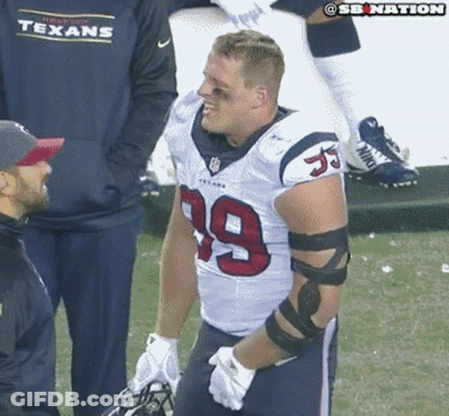 A Man Wearing A Texans Jersey With The Number 39 On It GIF