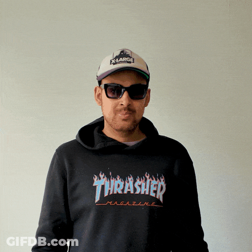 A Man Wearing A Thrasher Magazine Hoodie And Sunglasses GIF