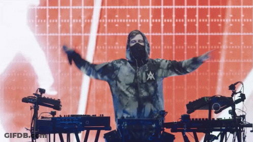 A Man Wearing A Tie Dye Hoodie With The Letter A On The Front GIF