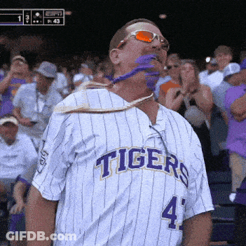 A Man Wearing A Tigers Jersey With The Number 4 On The Front GIF