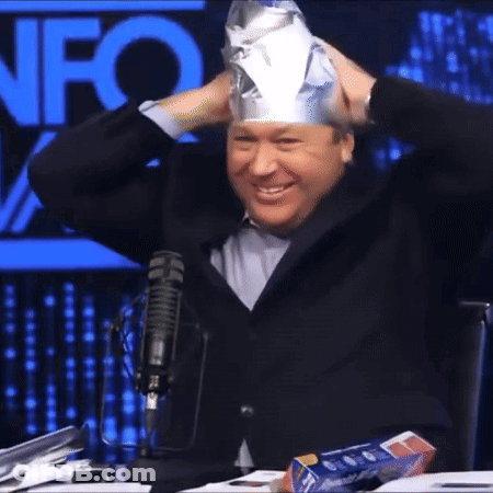 A Man Wearing A Tin Foil Hat In Front Of A Fox Logo GIF