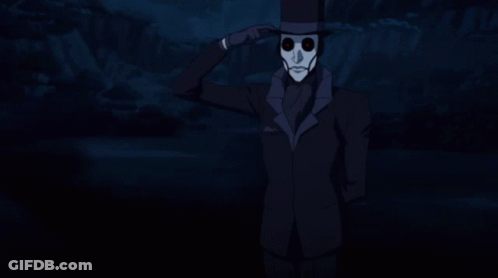 A Man Wearing A Top Hat And A Mask With Red Eyes GIF