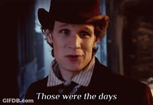 A Man Wearing A Top Hat And A Striped Shirt Says Those Were The Days GIF