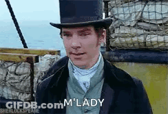 A Man Wearing A Top Hat And A Suit Is Standing On A Boat In The Ocean . GIF