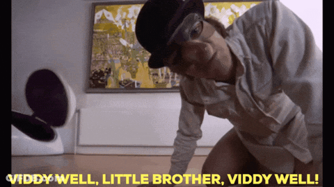 A Man Wearing A Top Hat And Goggles Says Viddy Well Little Brother GIF