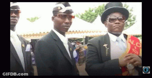 A Man Wearing A Top Hat And Sunglasses Is Standing Next To Another Man In A Suit GIF