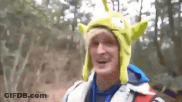 A Man Wearing A Toy Story Alien Hat And A Life Jacket . GIF
