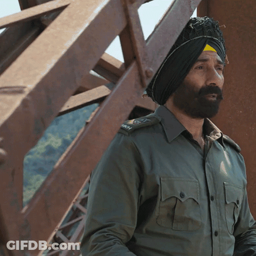 A Man Wearing A Turban And A Military Uniform With The Letters Army On The Sleeve GIF