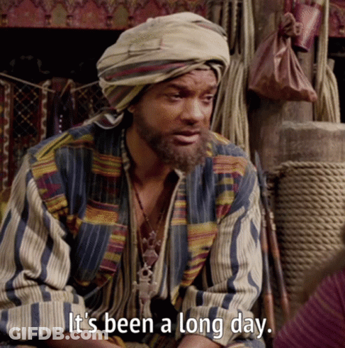 A Man Wearing A Turban And A Striped Shirt Says It 'S Been A Long Day GIF