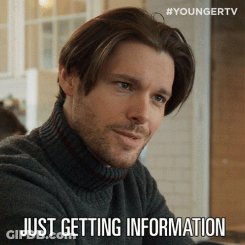 A Man Wearing A Turtleneck Sweater With The Words Just Getting Information Below Him GIF