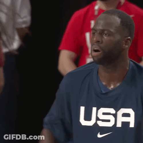 A Man Wearing A Usa Shirt Looks Surprised GIF