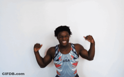 A Man Wearing A Usa Tank Top Is Dancing GIF