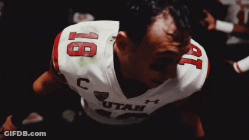 A Man Wearing A Utah Jersey With The Number 19 On It GIF