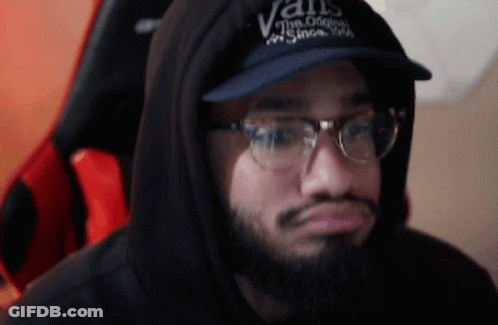 A Man Wearing A Vans Hat And Glasses GIF