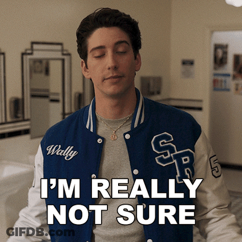 A Man Wearing A Varsity Jacket That Says Wally On It GIF