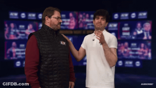 A Man Wearing A Vest That Says Nc On It GIF