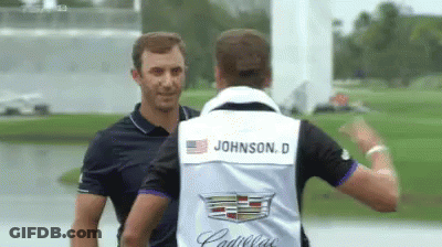 A Man Wearing A Vest With The Name Johnson On It GIF