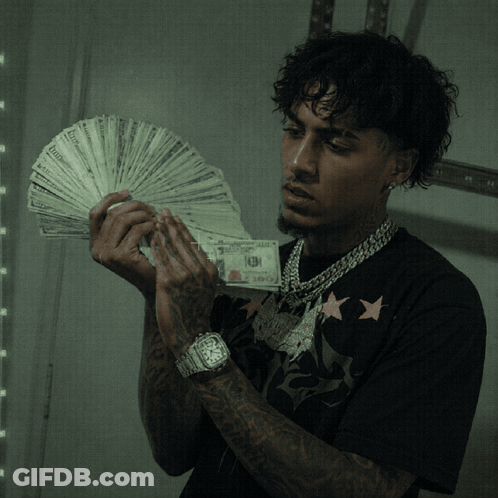 A Man Wearing A Watch Holds A Fan Of Money That Says ' Twenty ' On It GIF