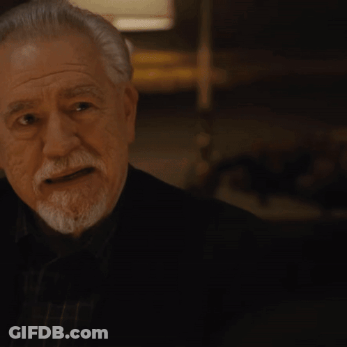 A Man Wearing A Watch Looks At Something GIF