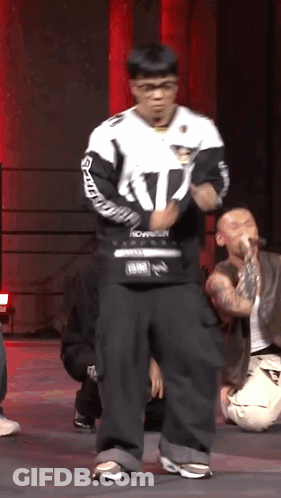 A Man Wearing A White And Black Jacket With The Number 17 On It GIF