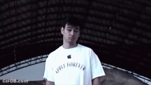 A Man Wearing A White Apple Forever Shirt GIF