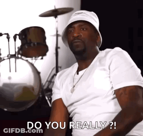 A Man Wearing A White Hat And A White Shirt Is Sitting In Front Of A Drum Set And Asking Do You Really ? GIF