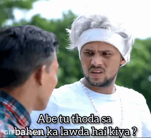Man With White Headband Talking To Man In Plaid Shirt GIF