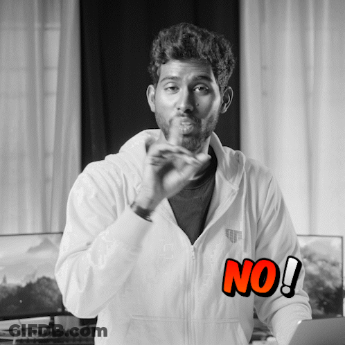 A Man Wearing A White Hoodie With The Word No Written On It GIF