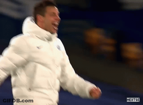 A Man Wearing A White Jacket With The Word Heiitse On It GIF