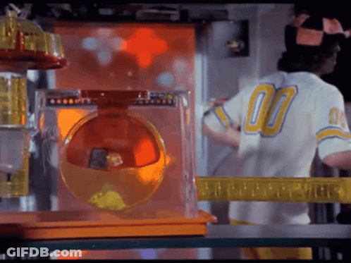 A Man Wearing A White Jersey With The Number 00 On It GIF