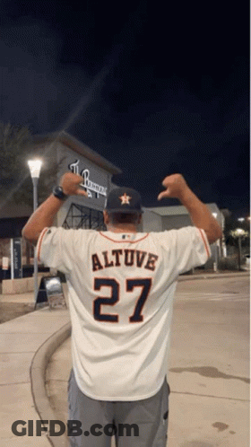 A Man Wearing A White Jersey With The Number 27 On The Back GIF