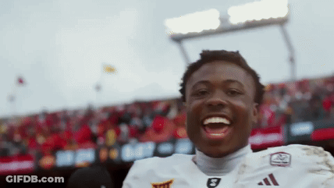 A Man Wearing A White Jersey With The Number 8 On It GIF