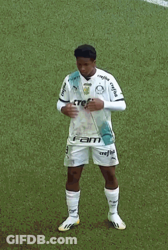 A Man Wearing A White Jersey With The Word Avanti On The Front GIF