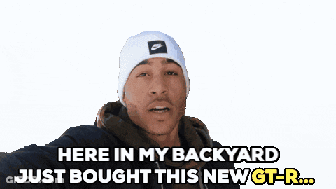 A Man Wearing A White Nike Beanie Says " Here In My Backyard Just Bought This New Gt-R " GIF