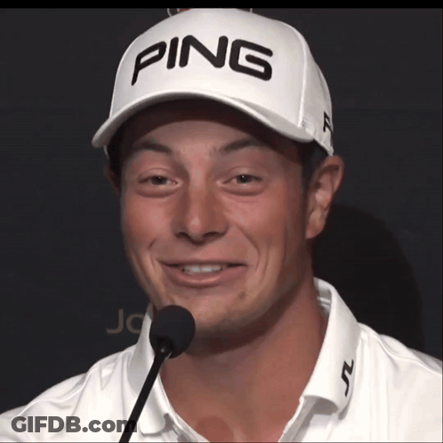 A Man Wearing A White Ping Hat Is Smiling GIF