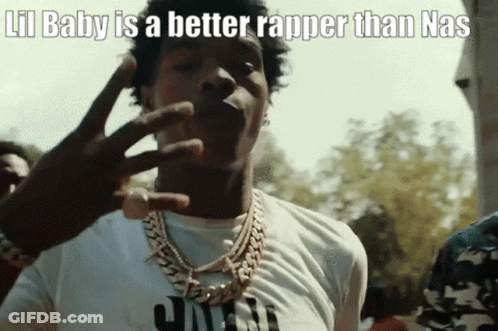 A Man Wearing A White Shirt And A Gold Chain Is Making A Funny Face . GIF
