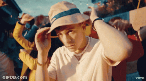 Man In White Shirt And Vevo Hat GIF