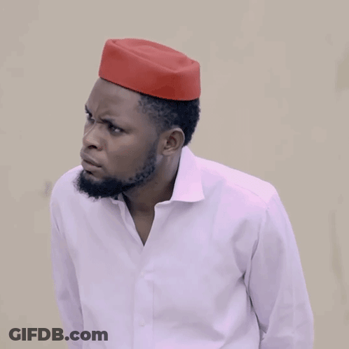 A Man Wearing A White Shirt And A Red Hat Is Asking How Much GIF