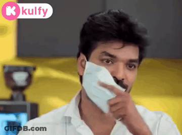 A Man Wearing A White Shirt And A White Face Mask GIF