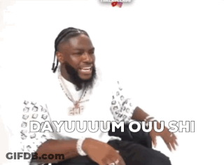 A Man Wearing A White Shirt And Black Pants Has The Words Dayuum Ouu Shi On The Bottom Of His Pants GIF