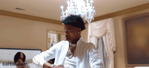 A Man Wearing A White Shirt That Says A & T On It GIF