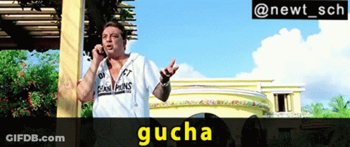 A Man Wearing A White Shirt That Says Champions On It Is Talking On A Cell Phone GIF