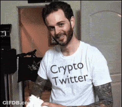 A Man Wearing A White Shirt That Says Crypto Twitter On It GIF